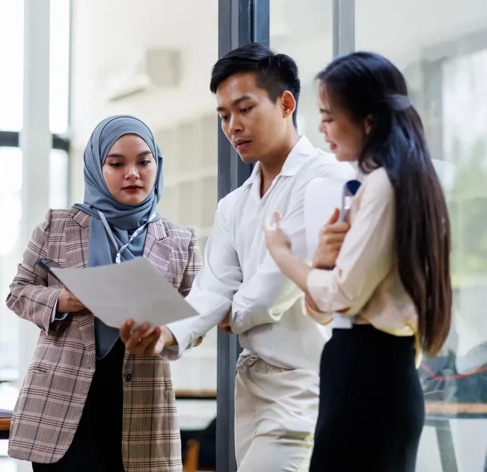 Young,Business,Asian,Colleague,Discussion,With,Window,Background,Financial,Advisor
